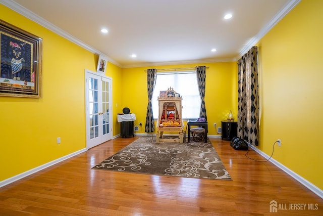 45 Green Ash St, Monroe, NJ 08831 - sitting room featuring wood finished floors, french doors, crown molding, baseboards, and recessed lighting