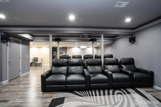 45 Green Ash St, Monroe, NJ 08831 - cinema room with wood finished floors, baseboards, recessed lighting, and crown molding