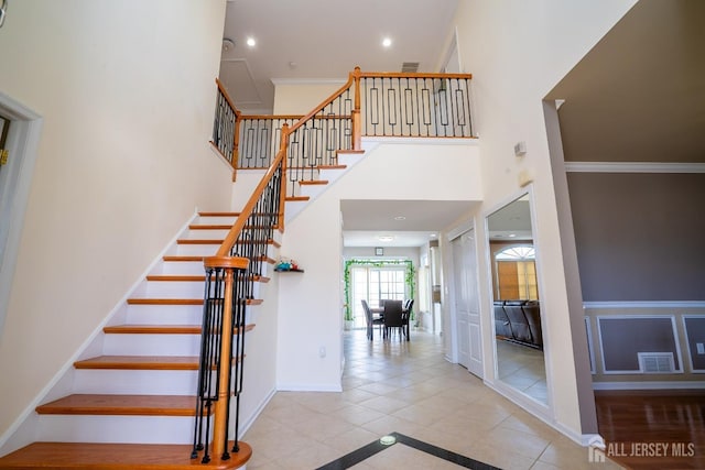 45 Green Ash St, Monroe, NJ 08831 - stairway with a high ceiling, recessed lighting, tile patterned flooring, ornamental molding, and baseboards