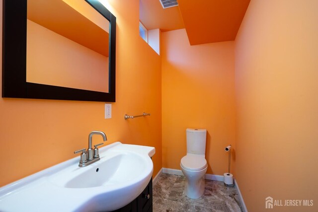 45 Green Ash St, Monroe, NJ 08831 - bathroom featuring toilet, vanity, and baseboards