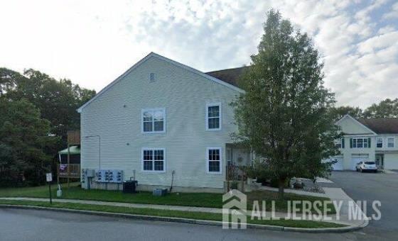47 Woodland Ave, Absecon, NJ 08201 - view of side of property featuring central AC unit
