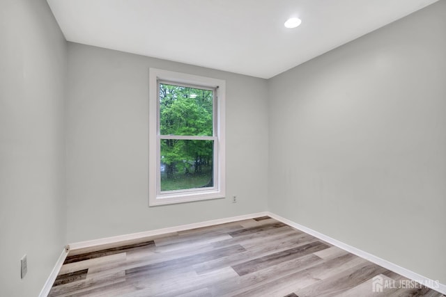 73 Doe Ct, South Brunswick, NJ 08852 - spare room featuring wood finished floors, baseboards, and recessed lighting