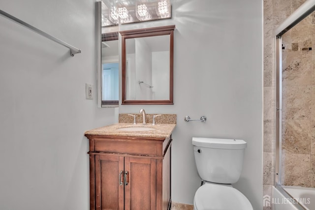 73 Doe Ct, South Brunswick, NJ 08852 - full bathroom with toilet, vanity, and combined bath / shower with glass door