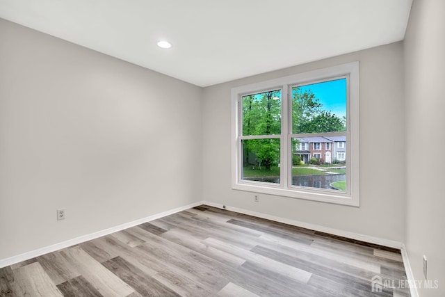 73 Doe Ct, South Brunswick, NJ 08852 - empty room featuring baseboards, wood finished floors, and recessed lighting
