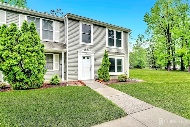 73 Doe Ct, South Brunswick, NJ 08852 - view of front of home featuring a front lawn