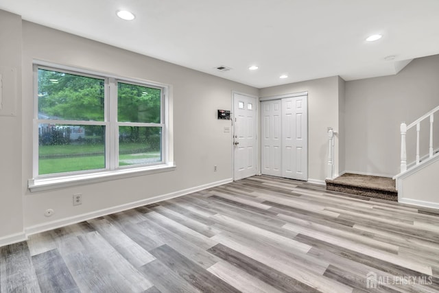 73 Doe Ct, South Brunswick, NJ 08852 - entrance foyer with stairs, recessed lighting, light wood-style floors, and baseboards