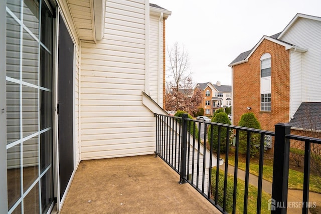 balcony featuring a residential view