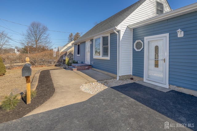 property entrance with a patio