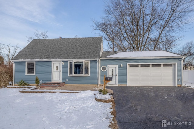 view of front of home with a garage