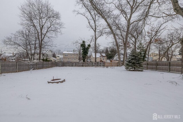 view of yard covered in snow