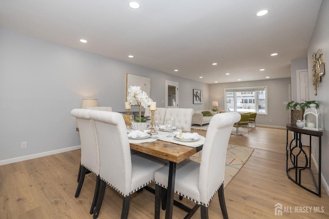 dining area with light wood-type flooring