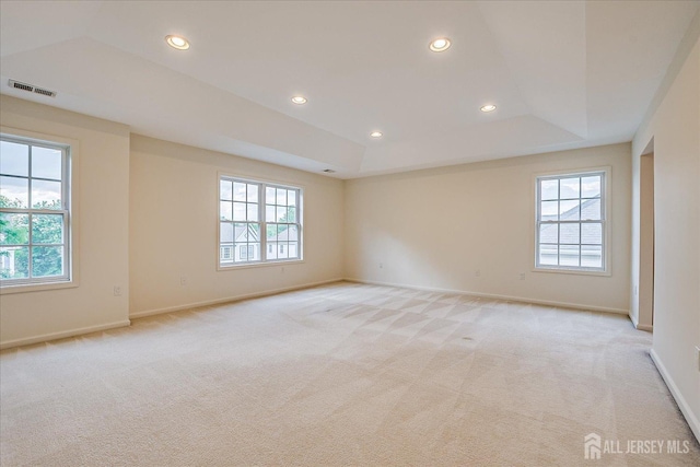 15 Fabiszewski Way, Parlin, NJ 08859 - empty room featuring light carpet, baseboards, a raised ceiling, and recessed lighting