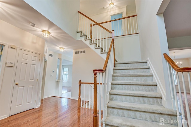 15 Fabiszewski Way, Parlin, NJ 08859 - staircase featuring wood finished floors, baseboards, and decorative columns