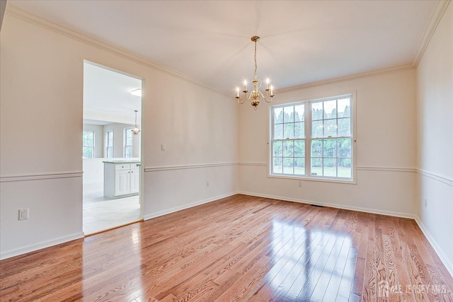 15 Fabiszewski Way, Parlin, NJ 08859 - empty room with a chandelier, wood finished floors, ornamental molding, and baseboards