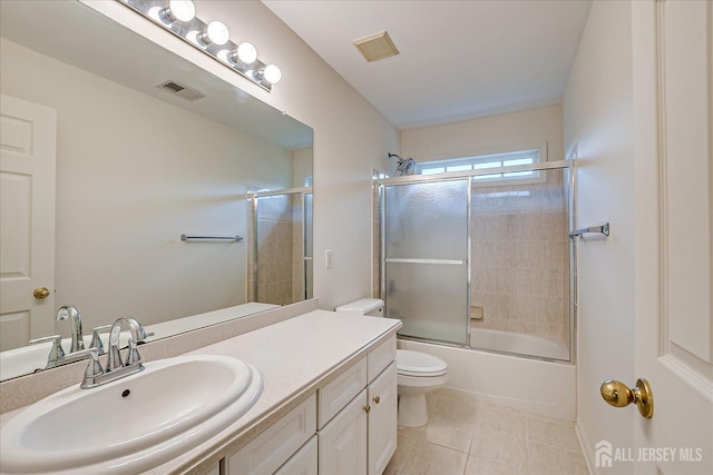 15 Fabiszewski Way, Parlin, NJ 08859 - bathroom with toilet, tile patterned flooring, vanity, and enclosed tub / shower combo