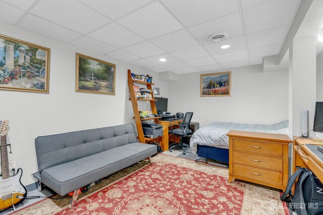 bedroom with recessed lighting, a paneled ceiling, and visible vents