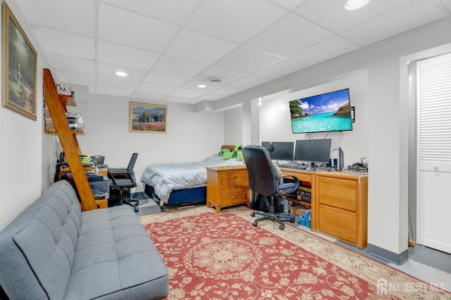 home office featuring recessed lighting and a paneled ceiling