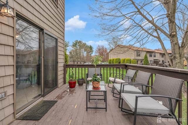view of wooden balcony featuring a wooden deck