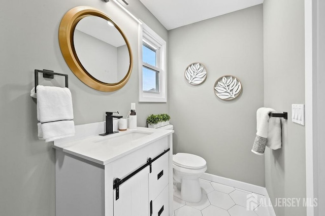 15 Clausen Ln, Sayreville, NJ 08872 - half bathroom with vanity and tile patterned flooring