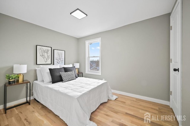 15 Clausen Ln, Sayreville, NJ 08872 - bedroom with light wood-style flooring