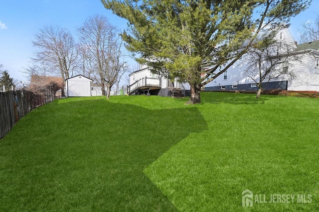 15 Clausen Ln, Sayreville, NJ 08872 - view of yard with a storage shed and a deck