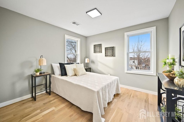 15 Clausen Ln, Sayreville, NJ 08872 - bedroom featuring light wood-type flooring