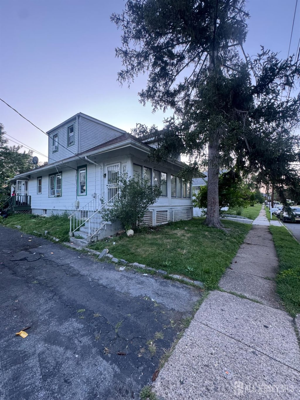 117 Browning Ave, Ewing, NJ 08638 - view of home's exterior with a lawn