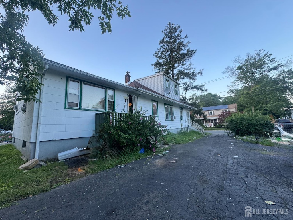 117 Browning Ave, Ewing, NJ 08638 - view of front facade featuring a chimney