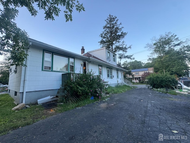 117 Browning Ave, Ewing, NJ 08638 - view of front facade featuring a chimney