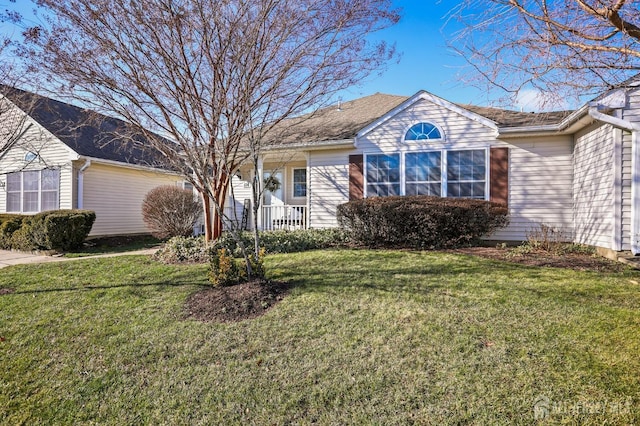 ranch-style home with a front lawn