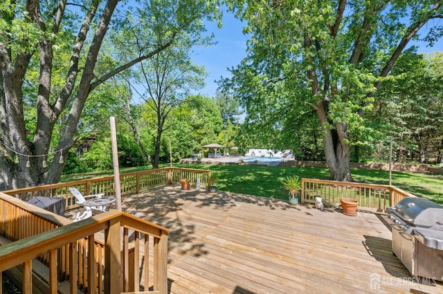 13 Orchard Pkwy, Morganville, NJ 07751 - wooden terrace featuring a yard, a grill, and view of scattered trees