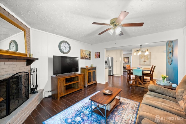 13 Orchard Pkwy, Morganville, NJ 07751 - living area with a baseboard radiator, a textured ceiling, wood finished floors, ceiling fan, and a fireplace