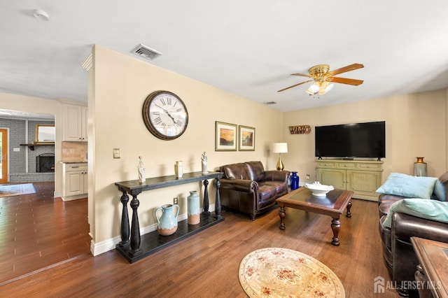 13 Orchard Pkwy, Morganville, NJ 07751 - living area with ceiling fan, wood finished floors, and baseboards