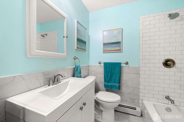 13 Orchard Pkwy, Morganville, NJ 07751 - full bath featuring baseboard heating, tile walls, toilet, vanity, and wainscoting