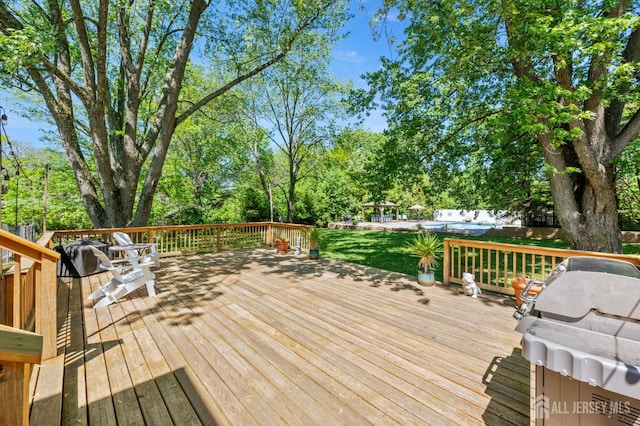 13 Orchard Pkwy, Morganville, NJ 07751 - wooden deck with view of scattered trees