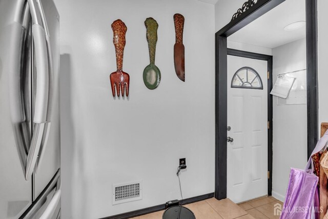 750 Barry Ave, Perth Amboy, NJ 08861 - foyer with baseboards, visible vents, and light tile patterned floors