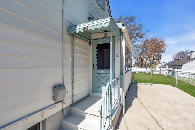 750 Barry Ave, Perth Amboy, NJ 08861 - property entrance with fence and a lawn