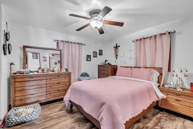 750 Barry Ave, Perth Amboy, NJ 08861 - bedroom featuring a ceiling fan and wood finished floors