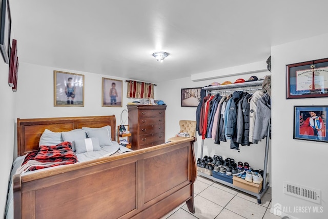 750 Barry Ave, Perth Amboy, NJ 08861 - bedroom with visible vents and light tile patterned floors