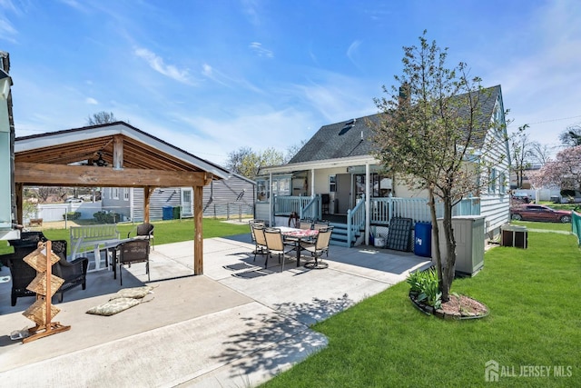 750 Barry Ave, Perth Amboy, NJ 08861 - view of patio / terrace with a gazebo, cooling unit, and outdoor dining area