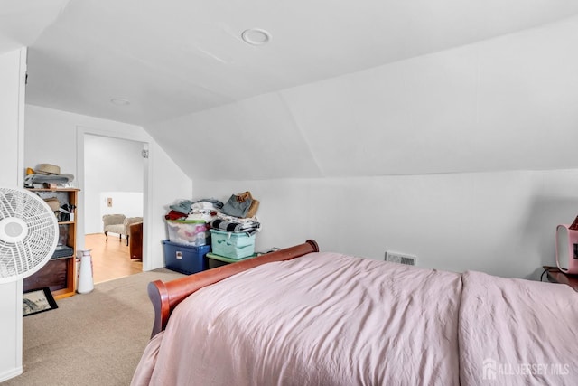 750 Barry Ave, Perth Amboy, NJ 08861 - bedroom featuring carpet floors, visible vents, and lofted ceiling