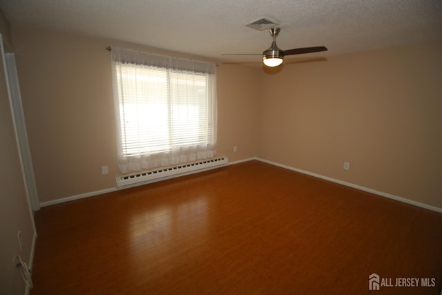 236-A Vernon Rd, Monroe, NJ 08831 - spare room with a baseboard radiator, ceiling fan, wood finished floors, and a textured ceiling