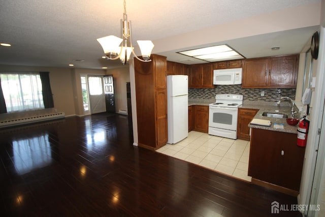 236-A Vernon Rd, Monroe, NJ 08831 - kitchen with white appliances, baseboard heating, light wood-type flooring, open floor plan, and recessed lighting