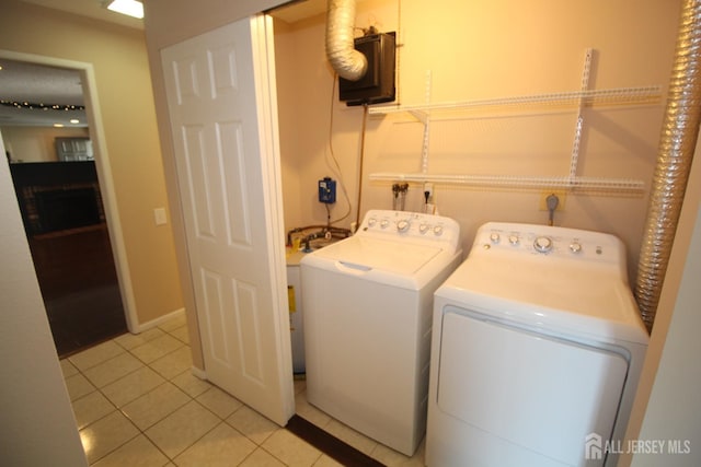 236-A Vernon Rd, Monroe, NJ 08831 - laundry room featuring washer and clothes dryer and light tile patterned floors