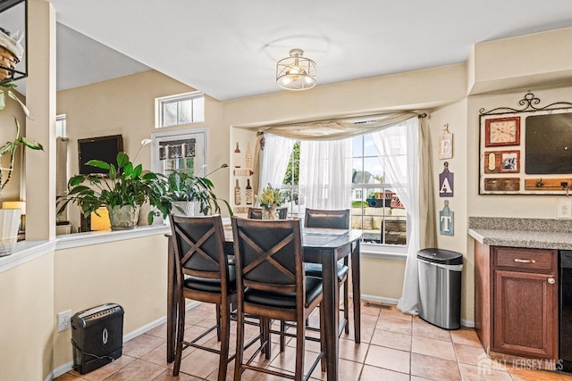 16 Dryden Dr, Burlington Twp, NJ 08016 - dining space with light tile patterned flooring and baseboards