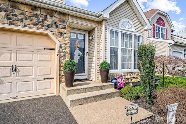 16 Dryden Dr, Burlington Twp, NJ 08016 - view of exterior entry with stone siding and driveway