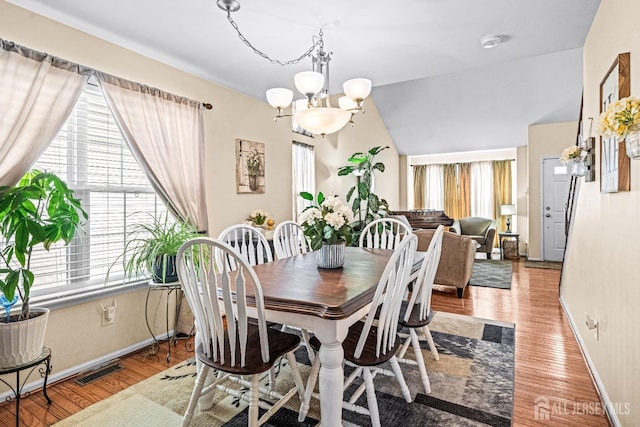 16 Dryden Dr, Burlington Twp, NJ 08016 - dining area featuring plenty of natural light, a chandelier, baseboards, and wood finished floors