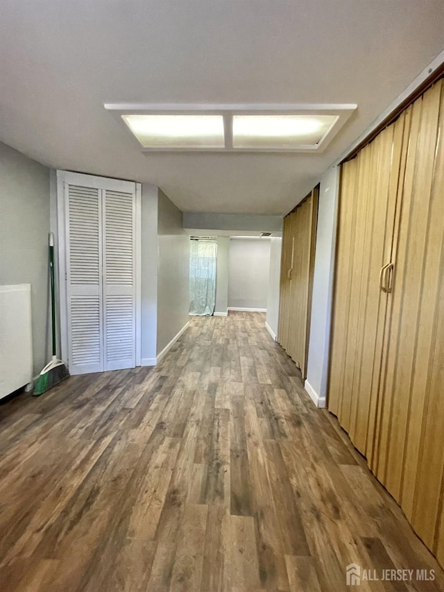 1211 S 9th St, South Plainfield, NJ 07080 - hall featuring wood finished floors and baseboards