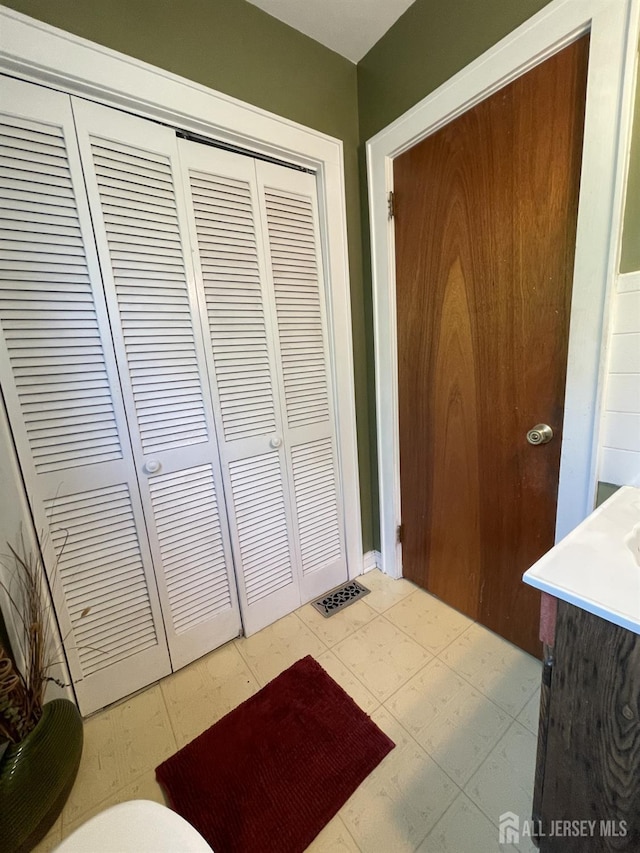1211 S 9th St, South Plainfield, NJ 07080 - bathroom featuring a closet and vanity