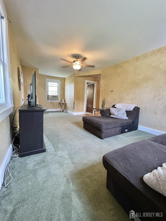 1211 S 9th St, South Plainfield, NJ 07080 - living area with baseboards, a ceiling fan, cooling unit, and carpet floors